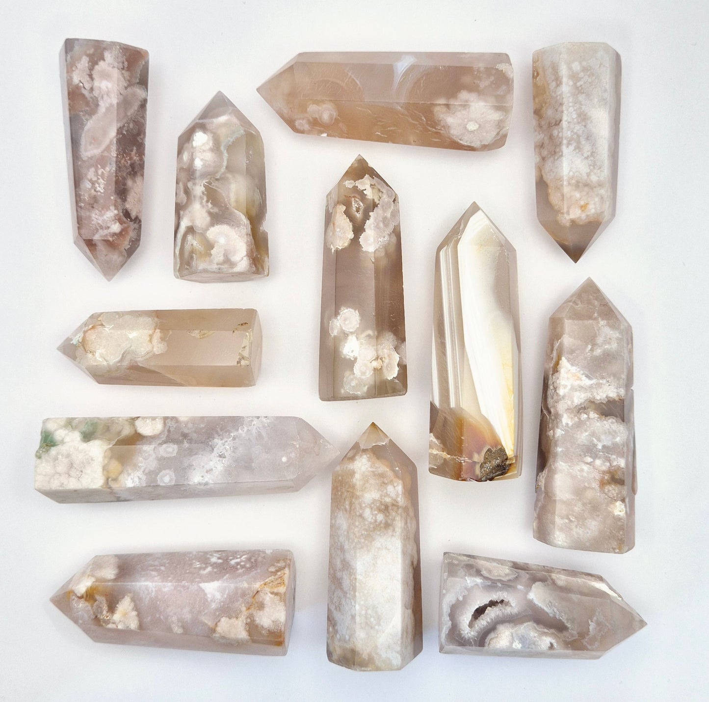 Flower Agate Tower, featuring beautiful, blossom-like patterns that inspire growth and healing. Flower Agate is known for its ability to encourage personal development and emotional healing, helping you to bloom into your full potential.