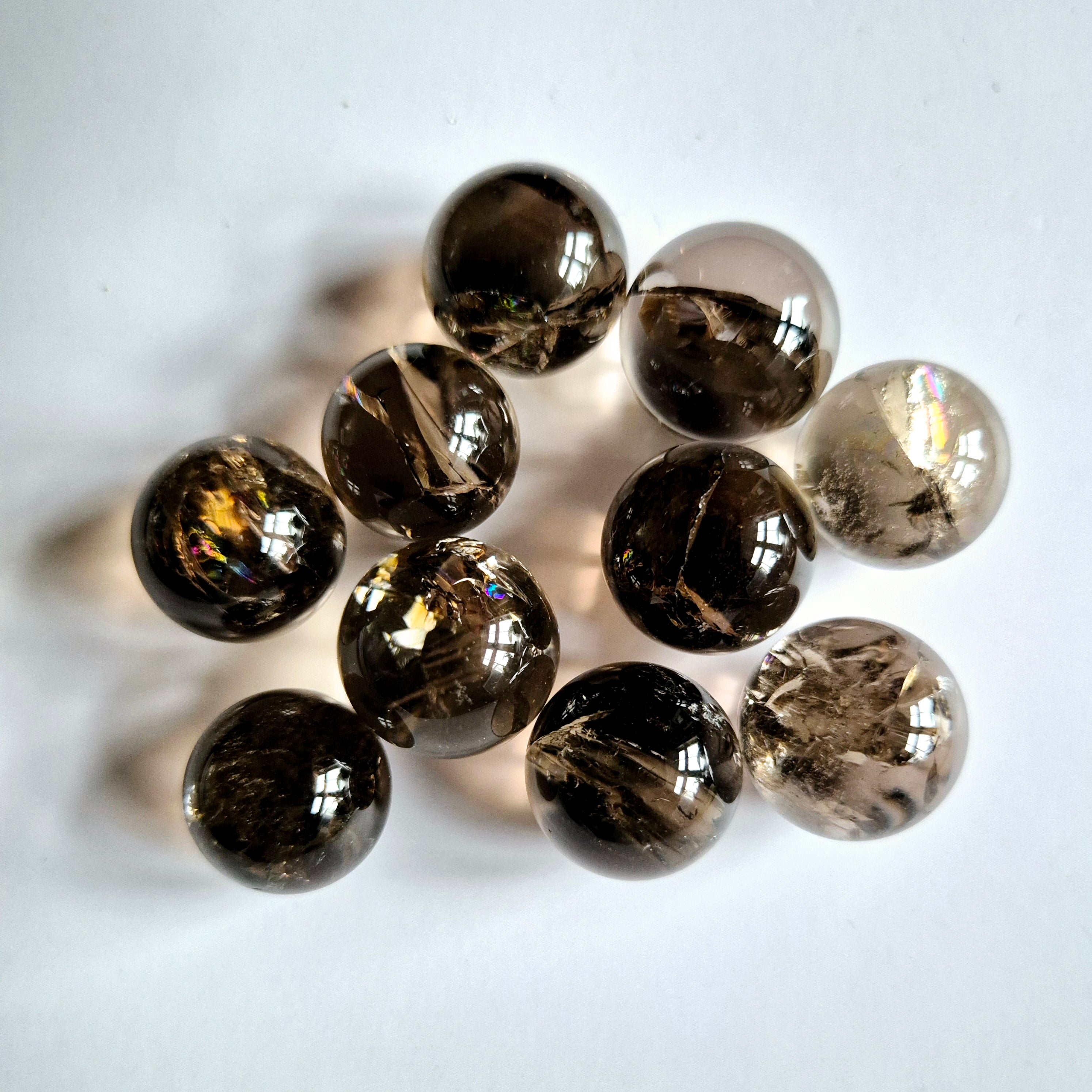 Ground and protect with a Smokey Quartz Sphere (2.5cm). Perfect for meditation, energy work, and adding balance to your crystal collection.