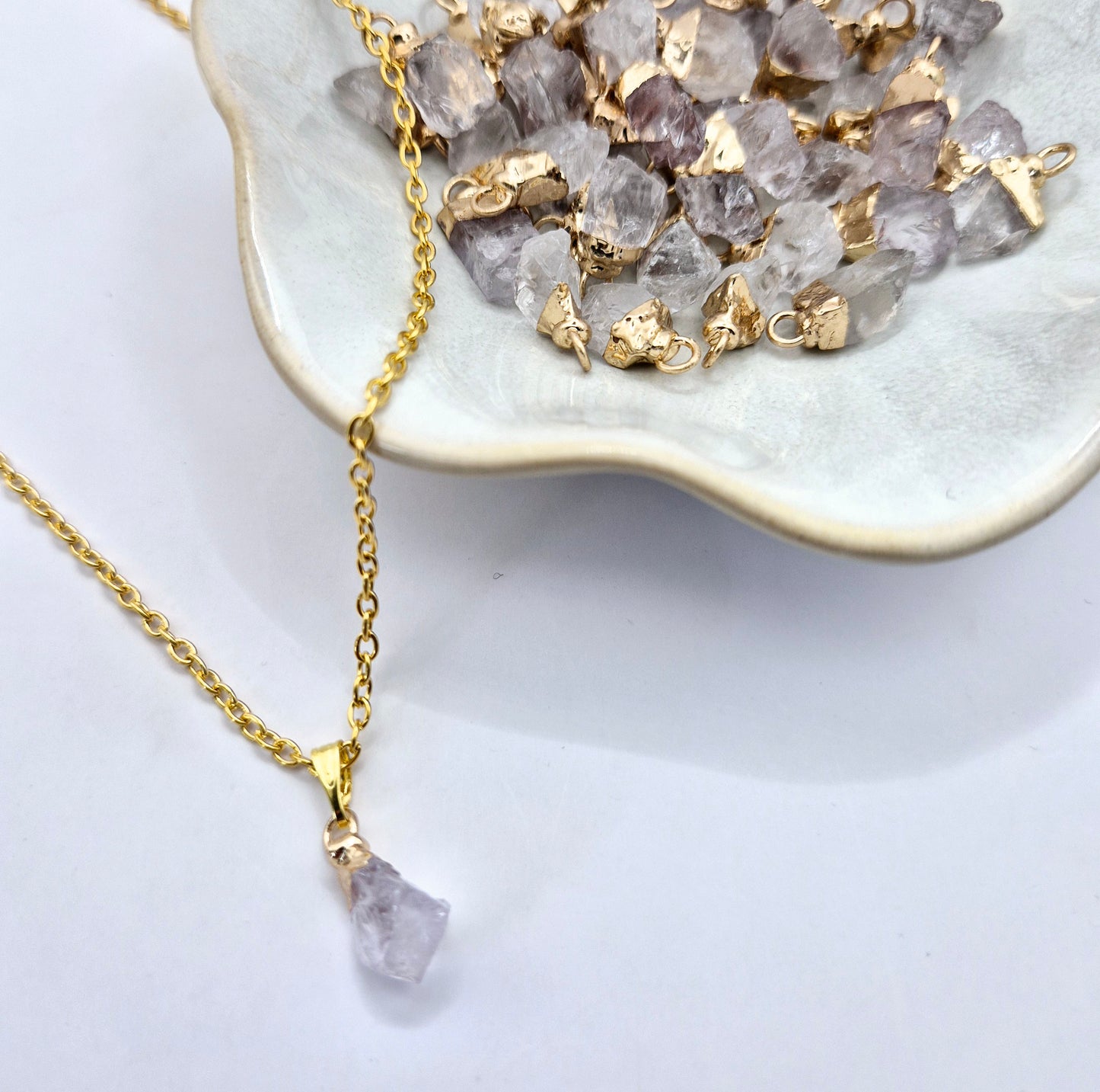 Gold-Colored Necklace with Raw Clear Quartz Pendant (1cm)