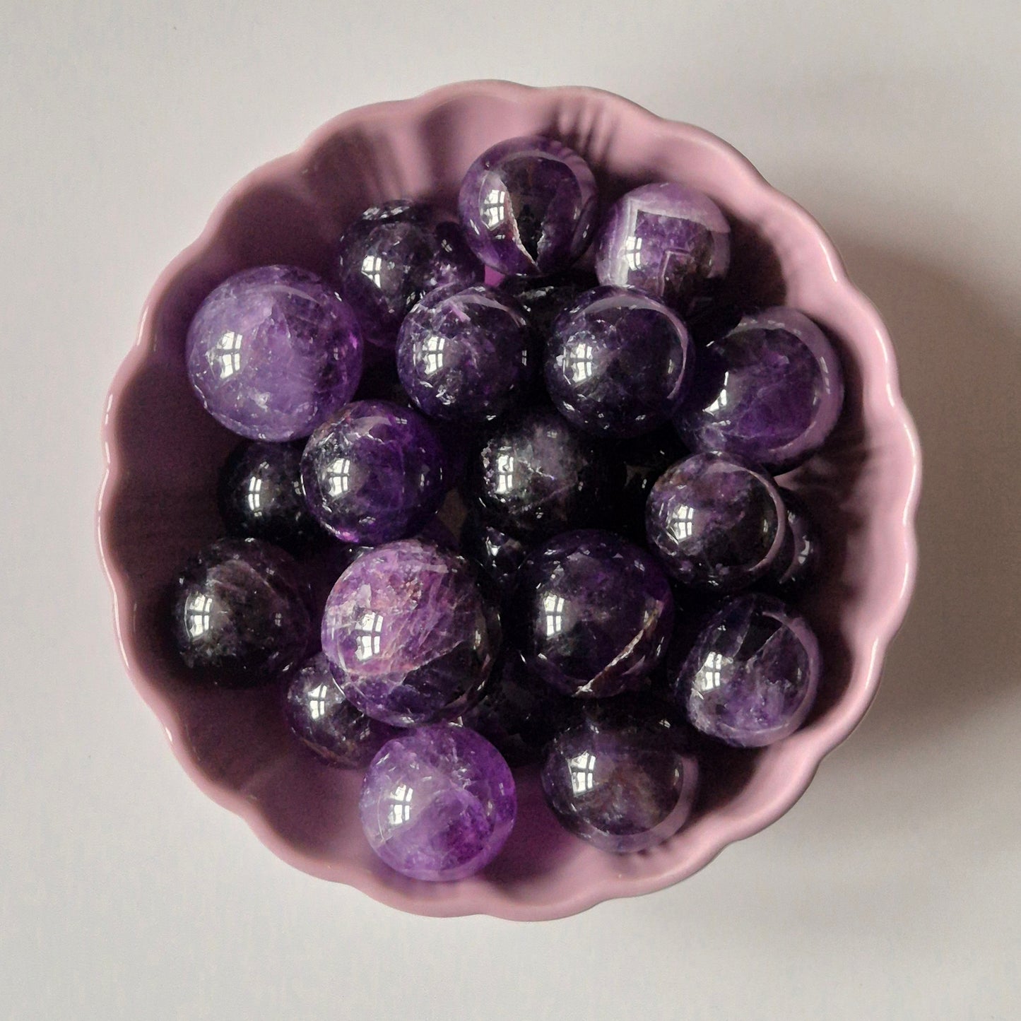 Experience tranquility with an Amethyst Sphere (2-3cm). Ideal for stress relief, meditation, and enhancing your spiritual connection.