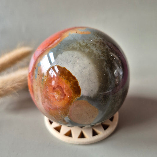 ocean jasper bol polychroom rood oranje edelsteen bol 70mm gepolijst