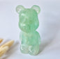 Groene fluoriet beer carving van 12 cm en 508 gram met natuurlijke mintgroene kleur en doorschijnende kristalstructuren.