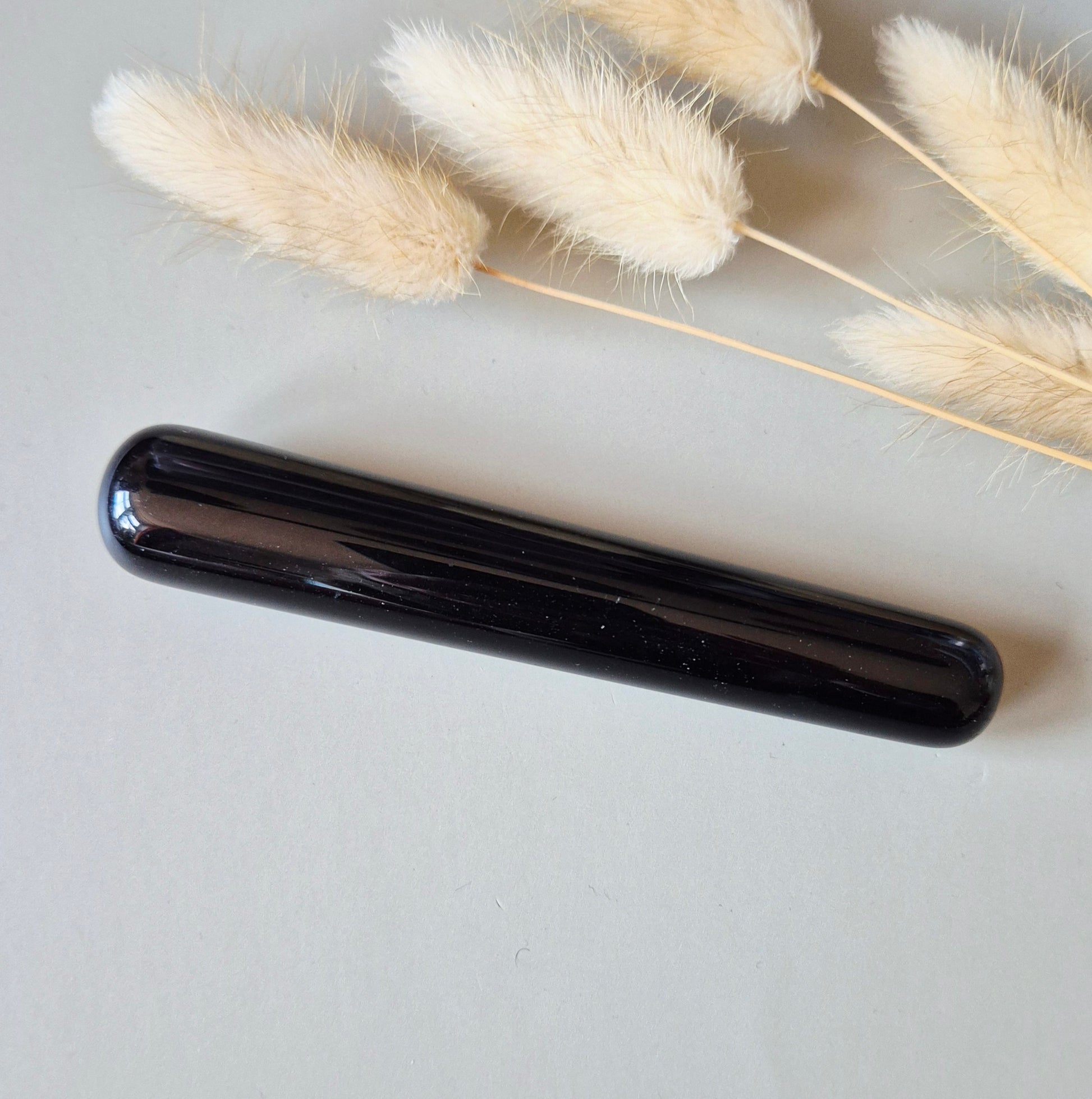 Zwarte edelsteen massage tool obsidiaan